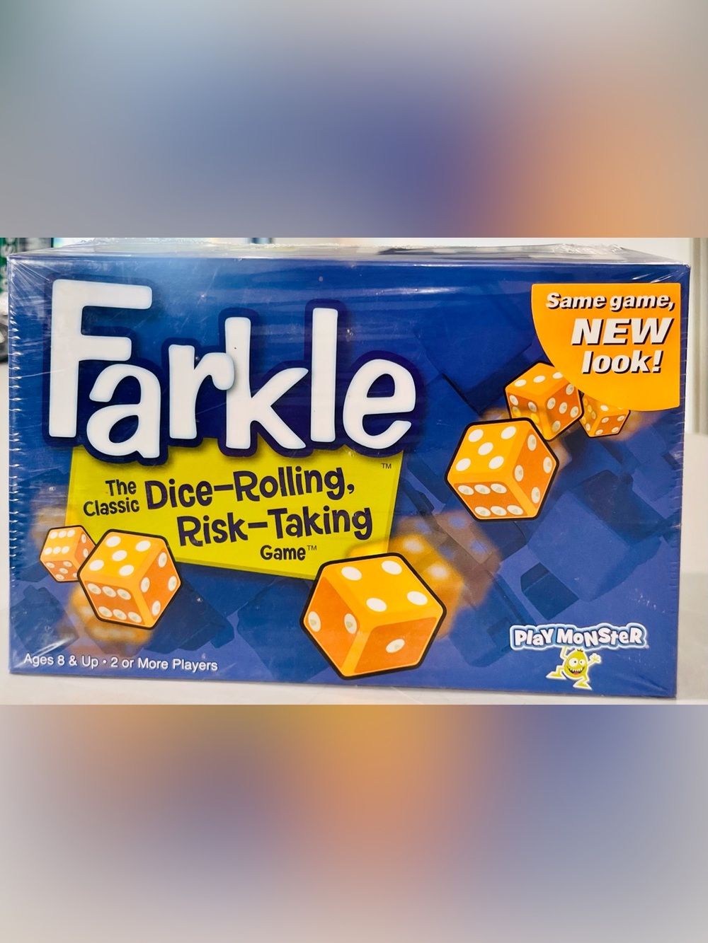 Farkle Dice-Rolling Board Game - Blue Box with Orange Dice